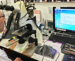 Hands free operation in front of microscope with the aid of foot control